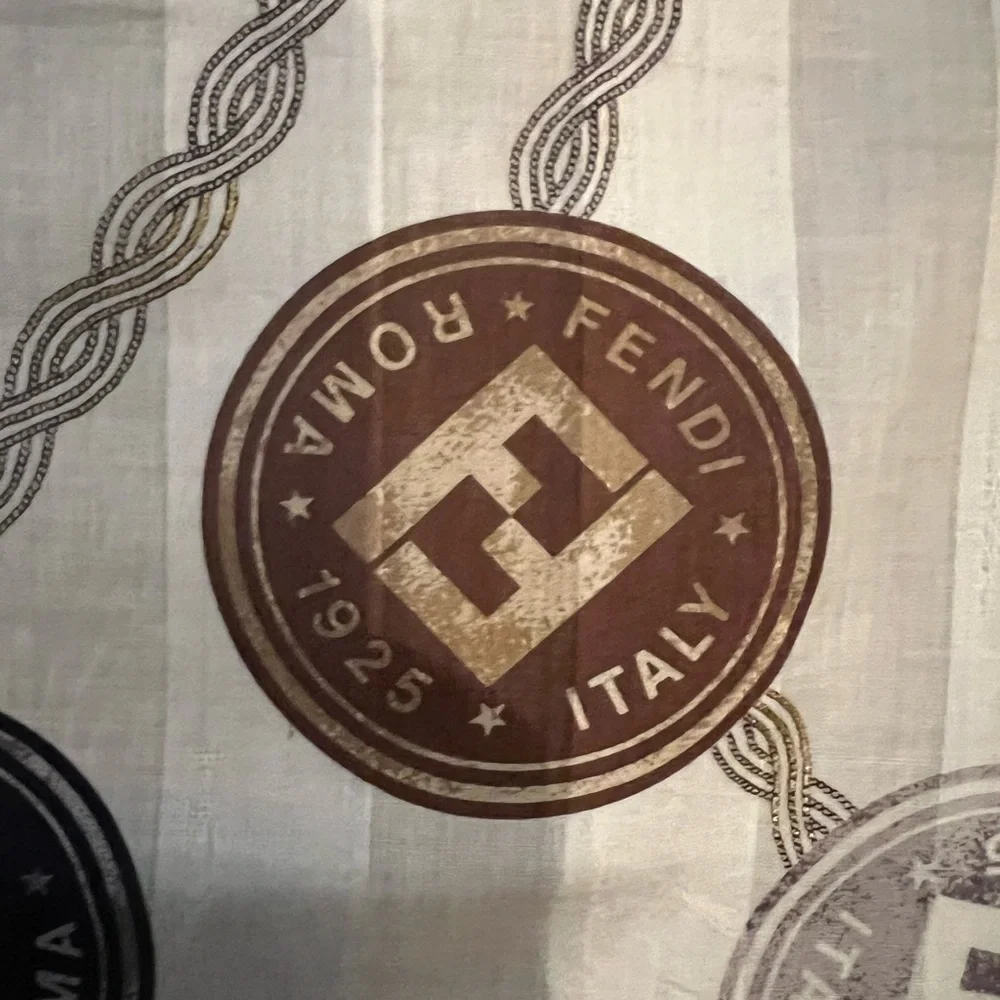 Fendi scarf 23 x 22.5” spend $400 get a free designer scarf valves at $400.